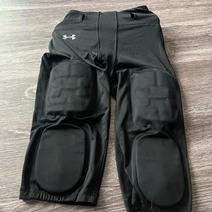 Two pairs of boys youth extra-large under armor padded football pants